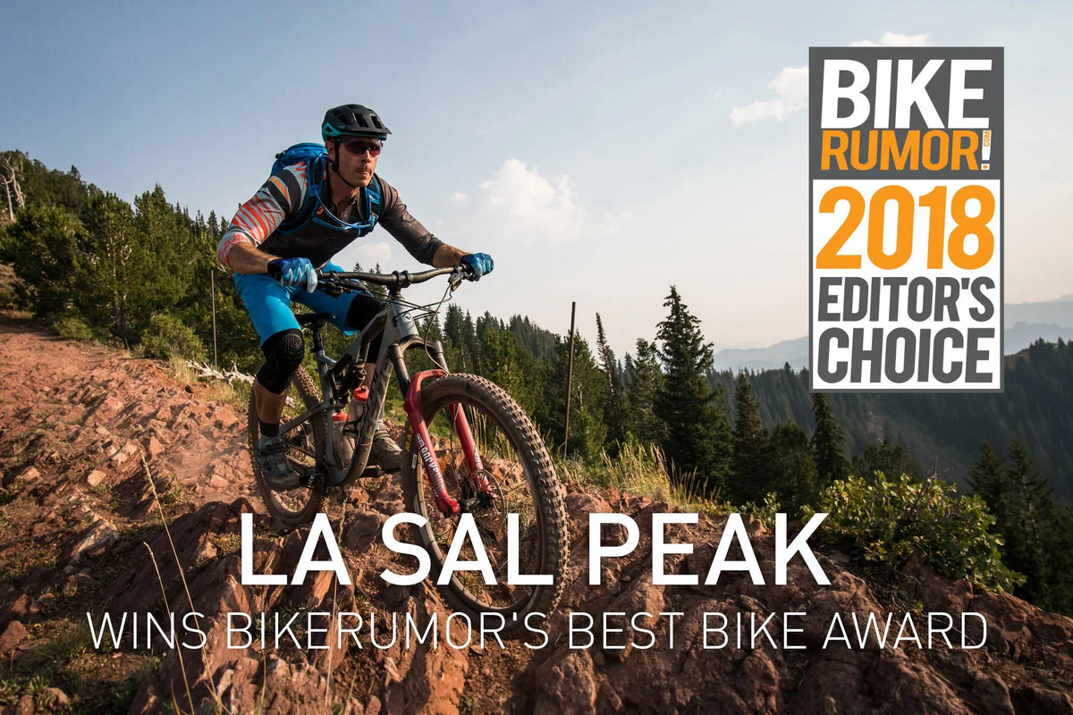 La Sal Peak wins Bikerumor's Best Bike award graphic with 2018 Editor's Choice badge over a rider on a trail