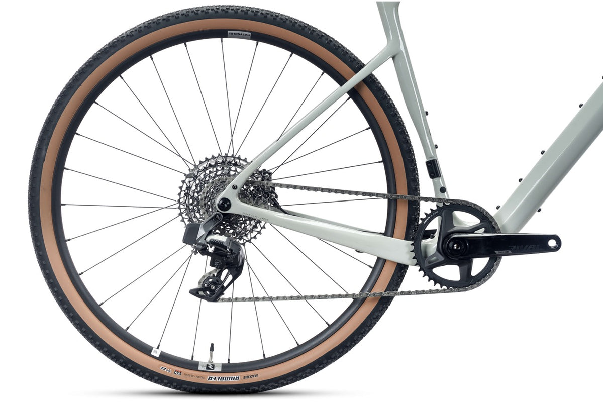 Rear wheel, cassette and chainstay of the Shafer 2.0 Elite gravel bike with tan-wall tire