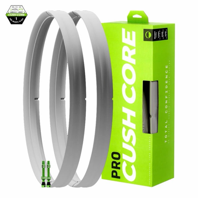CushCore PRO set of two gray tire inserts with two green valves beside the retail box