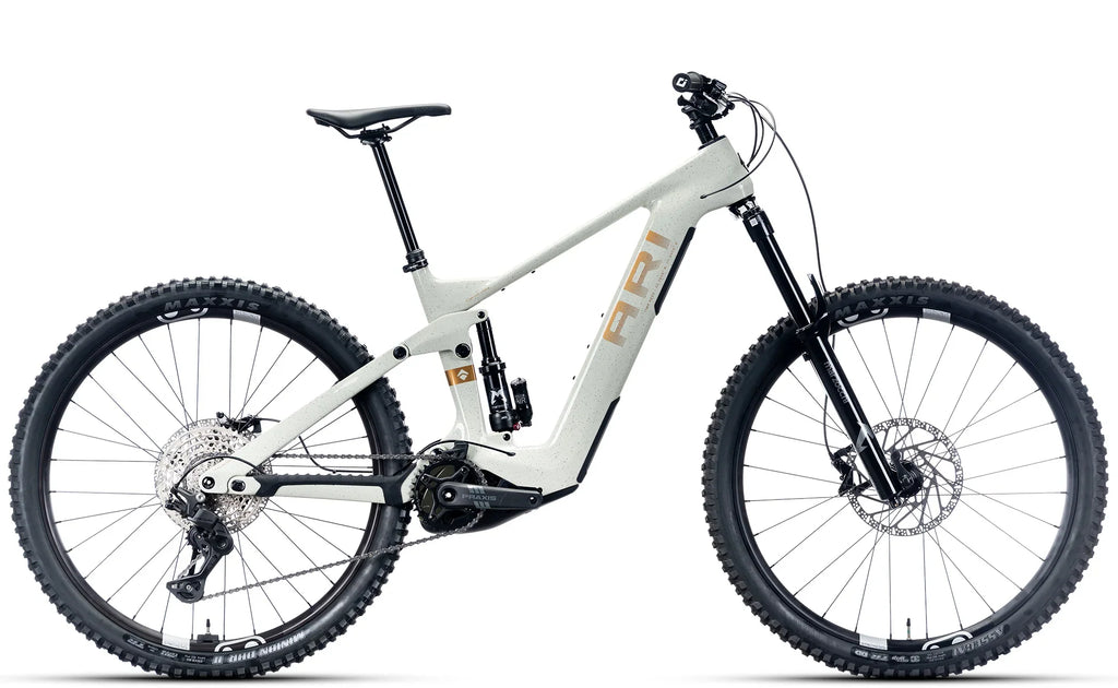 Timp Peak Comp electric mountain bike in White Gold, drive-side view