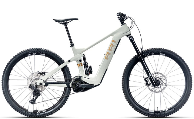 Timp Peak Comp electric mountain bike in White Gold, drive-side view