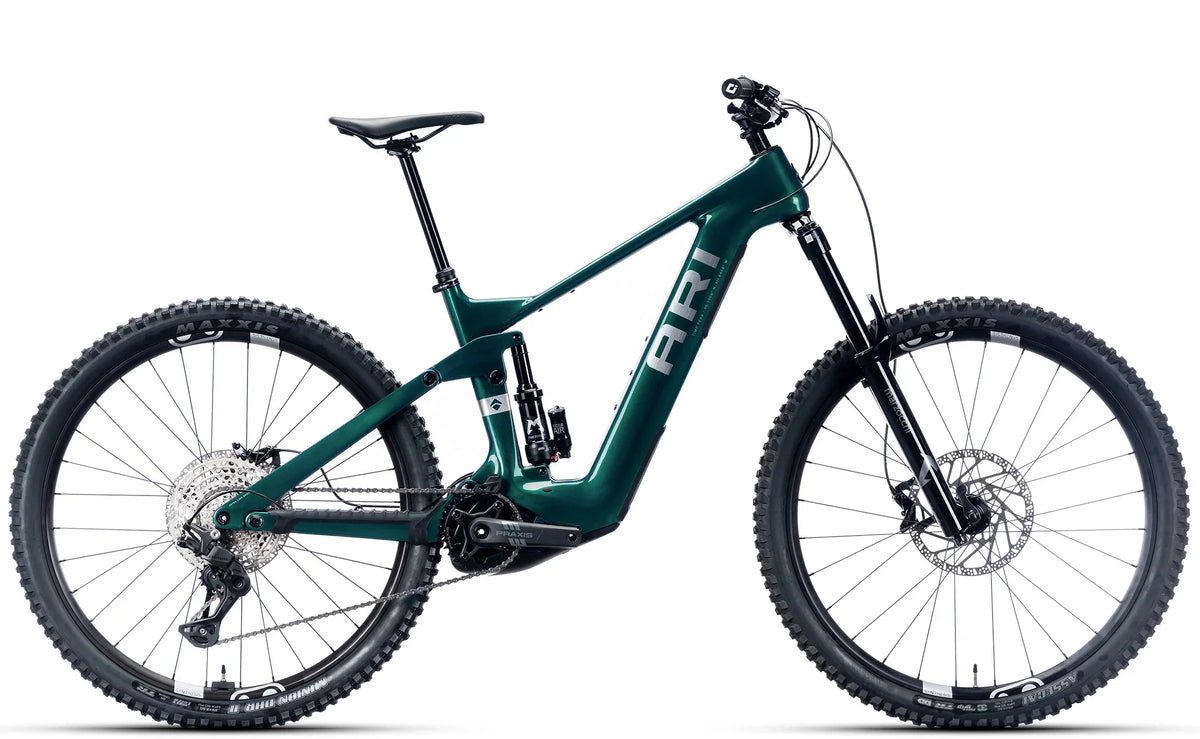 Timp Peak Comp electric mountain bike in Emerald Metallic, drive-side view