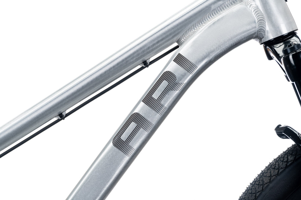 Silver 801 top tube and head tube with a black Ari decal and visible welds