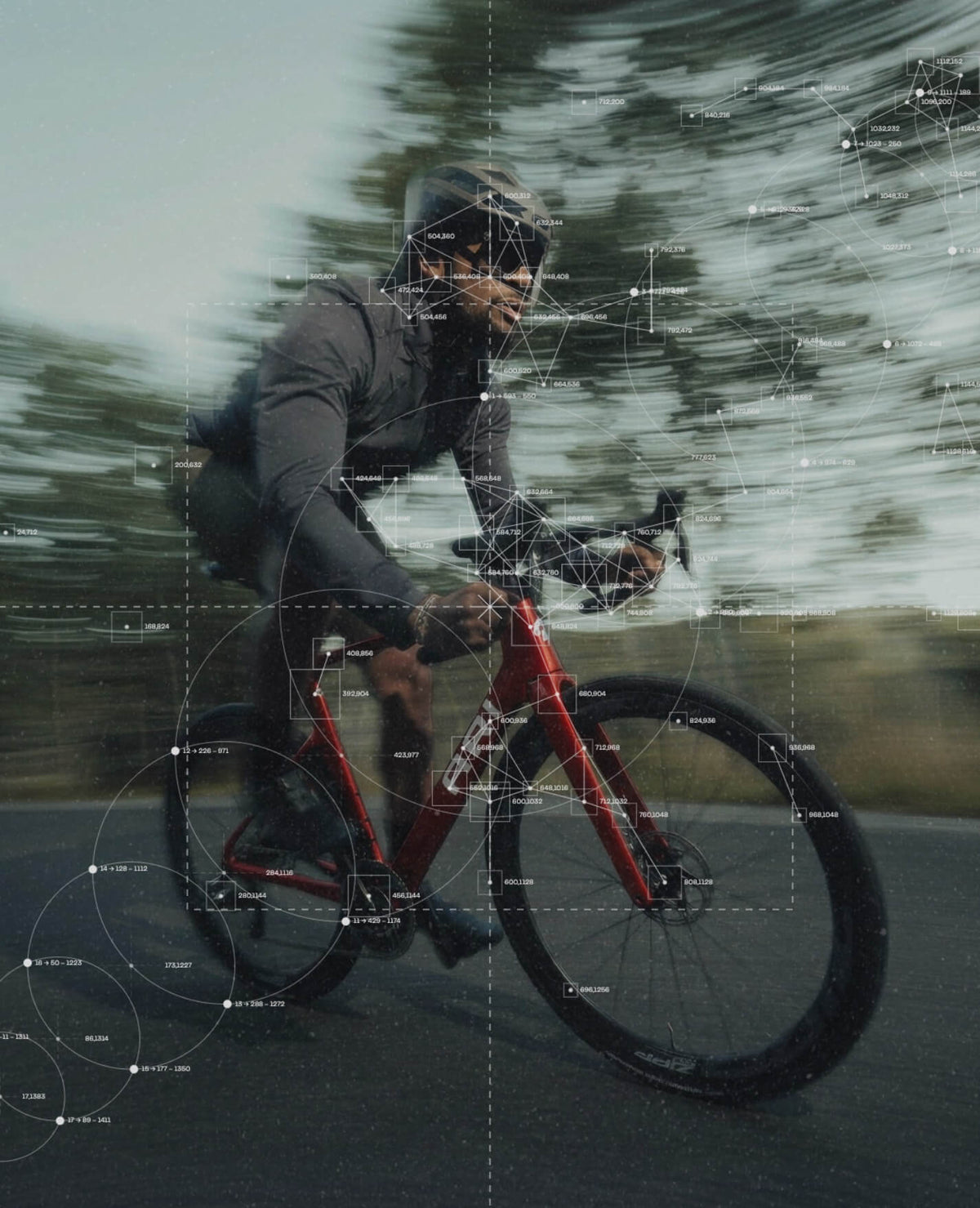 Rider leaning an Ari Veyo road bike through a curve with fine technical graph lines overlaid